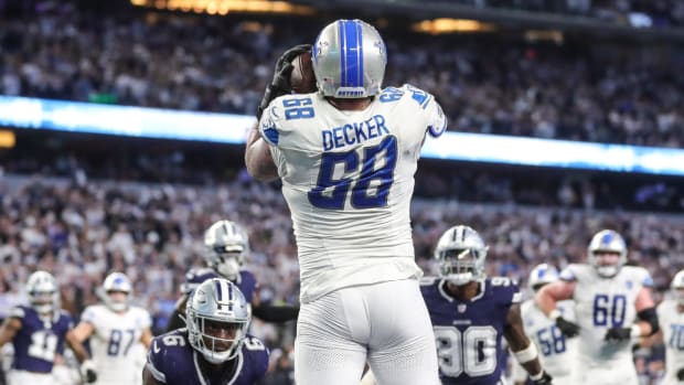 Lions offensive tackle Taylor Decker catches a pass for a two-point conversion, which was later negated.
